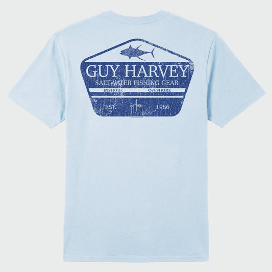Flat lay image of a light blue Guy Harvey t-shirt with a tuna graphic on the back against a white background