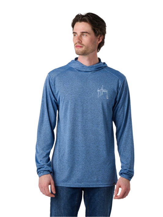 Man wearing a blue long-sleeve shirt with a logo on a white background