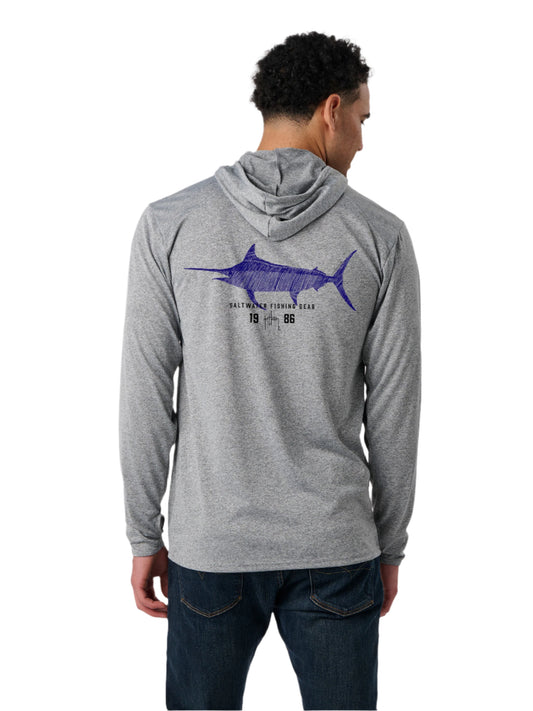 Person wearing a gray hoodie with a blue fish graphic on the back against a white background