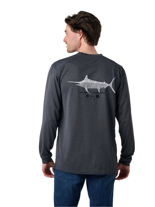 Man wearing a dark gray long-sleeve shirt with a fish graphic on the back against a white background