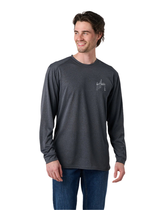 Man wearing a dark gray long-sleeve shirt with a logo on a white background