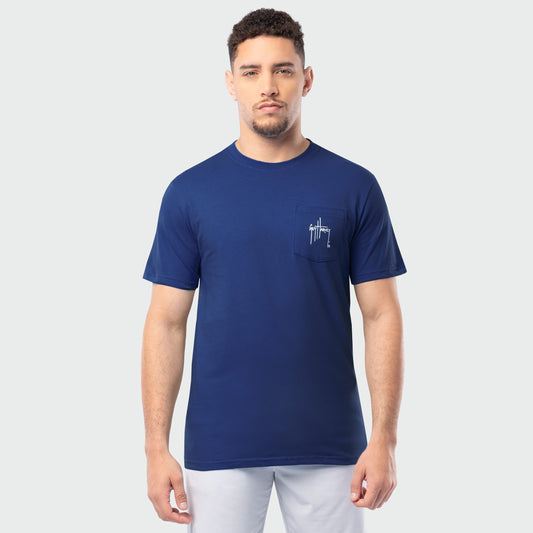 Man wearing a blue t-shirt with a Guy Harvey logo on a white background