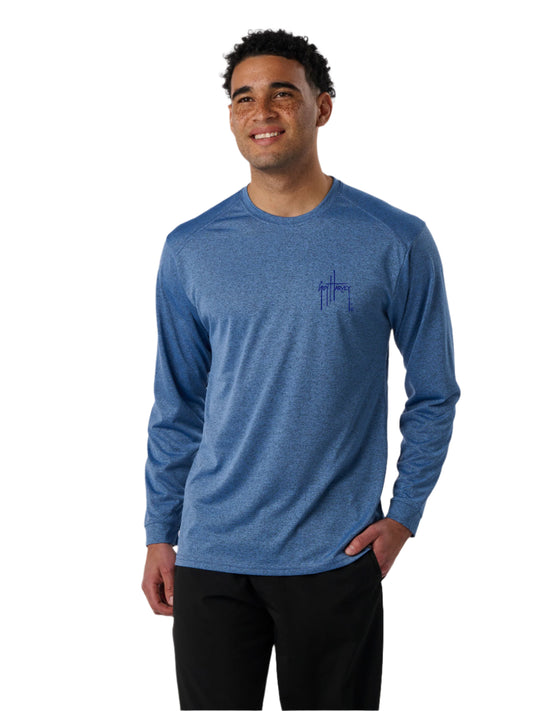 Man wearing a blue long-sleeve shirt with a logo on a white background