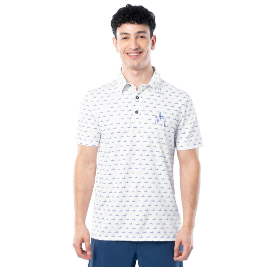 Front view of white Guy Harvey Men’s White Fleet Printed Performance Polo Shirt with blue boat pattern.