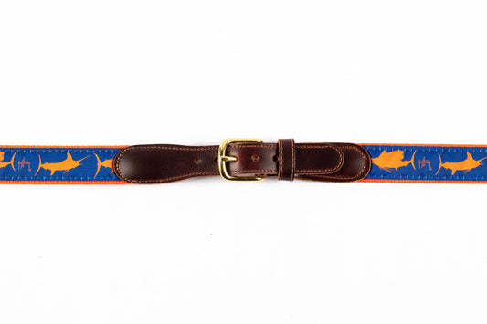 Guy Harvey men's Three Billfish leather tab belt with royal blue needlepoint billfish silhouettes and brass buckle.