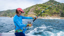 Jessica Harvey reeling in a catch