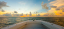A boat out at sunrise