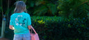 A women wearing a coastal wash tee from Guy Harvey