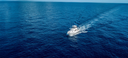 A boat offshore fishing