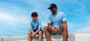 Father and Son wearing matching Guy Harvey Mariner Fishing Shirts