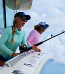 Women fishing on a boat