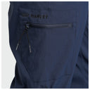 Close-up of navy blue fishing pants showing a zippered pocket with the brand name 'GUY HARVEY' in black on the pocket flap.