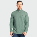 a guy wearing a Guy Harvey Coastal Classic Quarter zip in Sage green