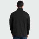 A man wearing a black Guy Harvey coastal classic quarter zip