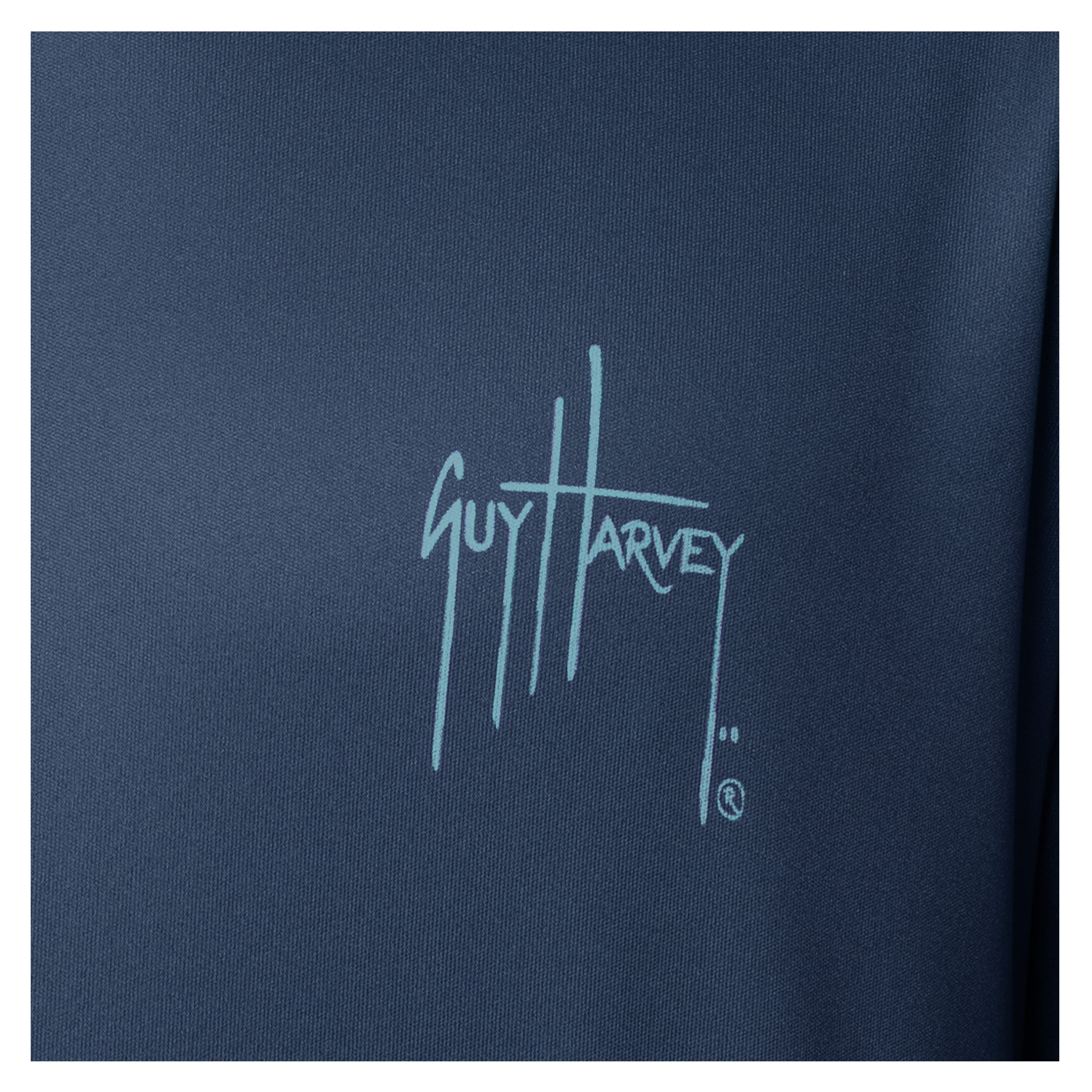 Guy Harvey logo on a navy blue background