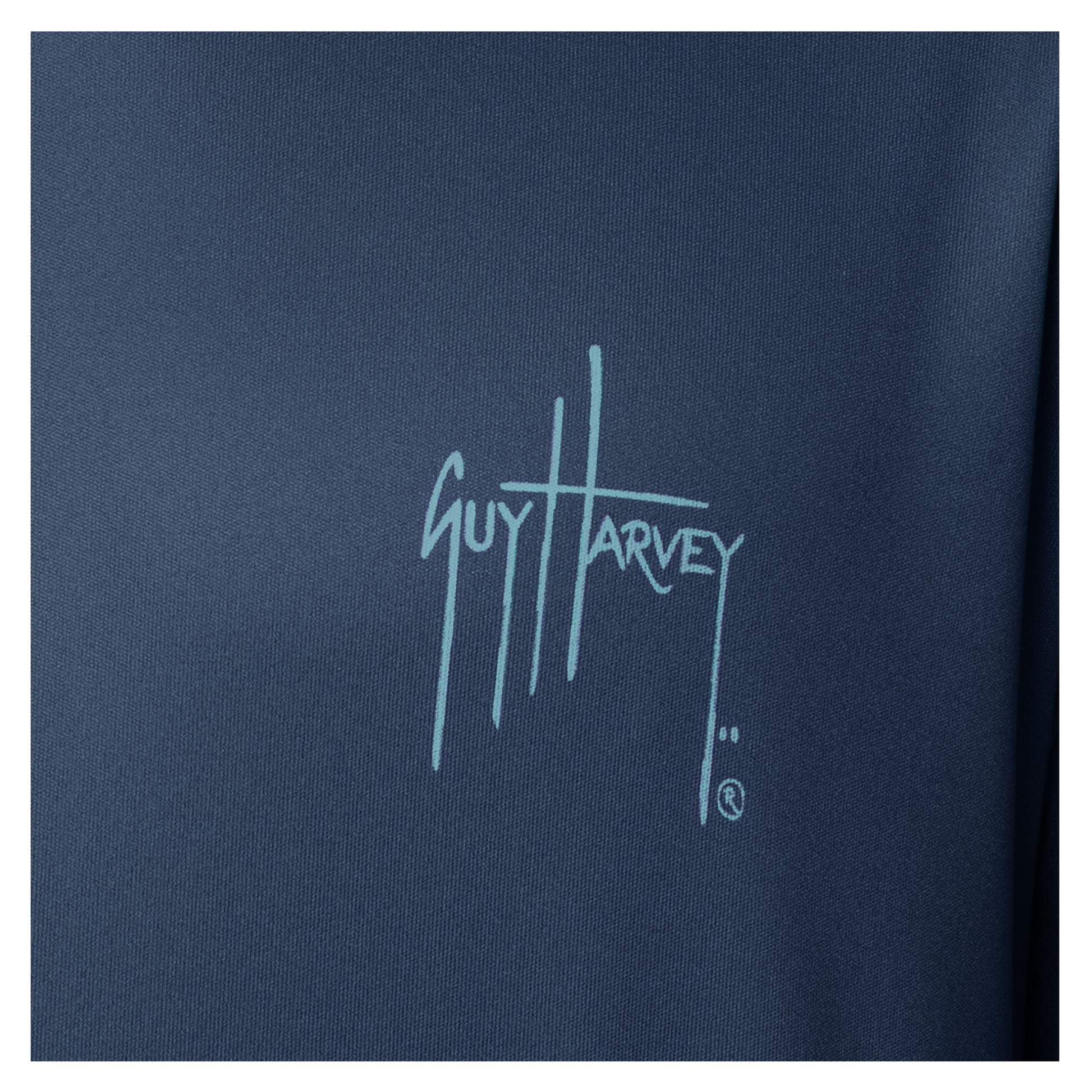 Guy Harvey logo on a navy blue background