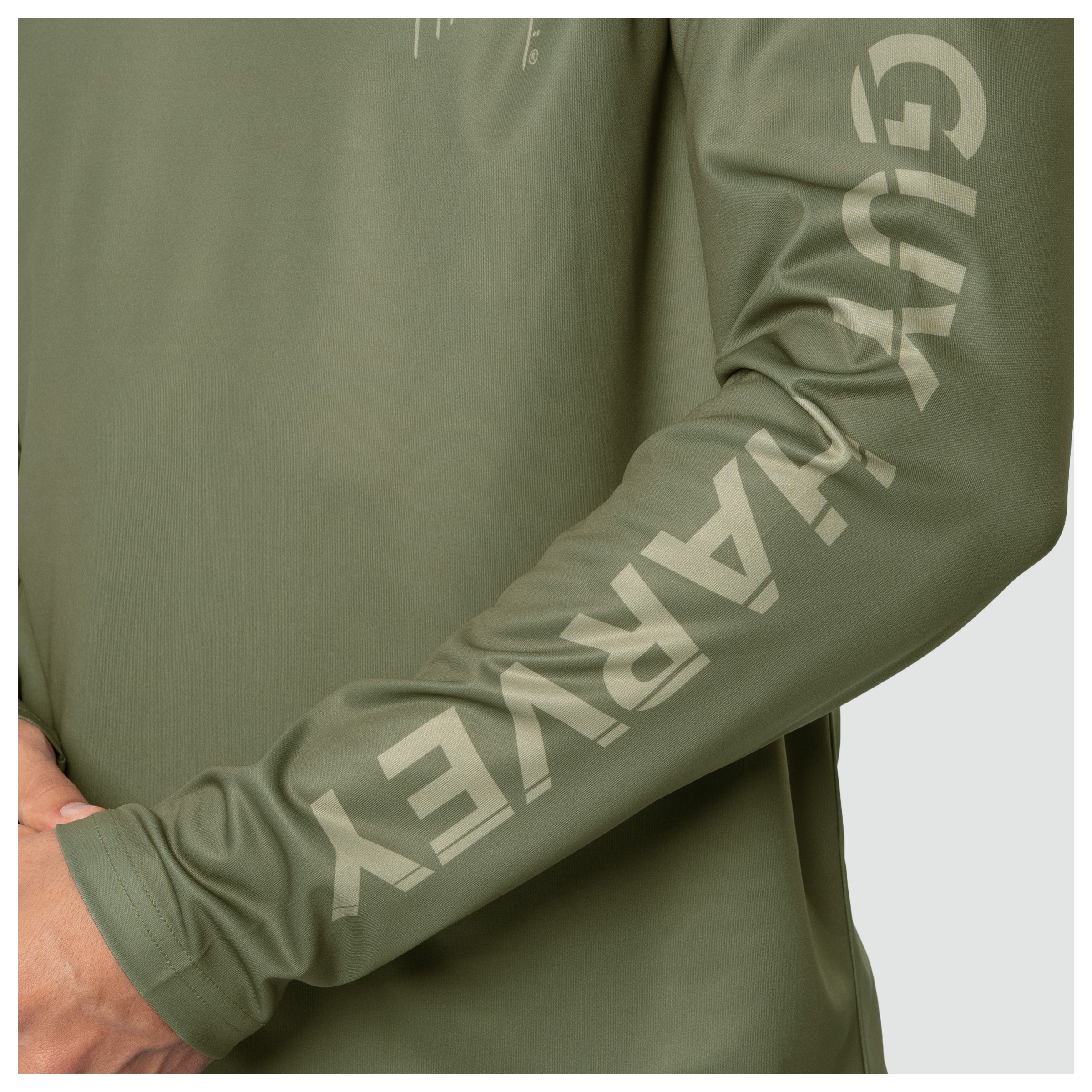 Green long-sleeve shirt with 'GUY Harvey' branding on a white background