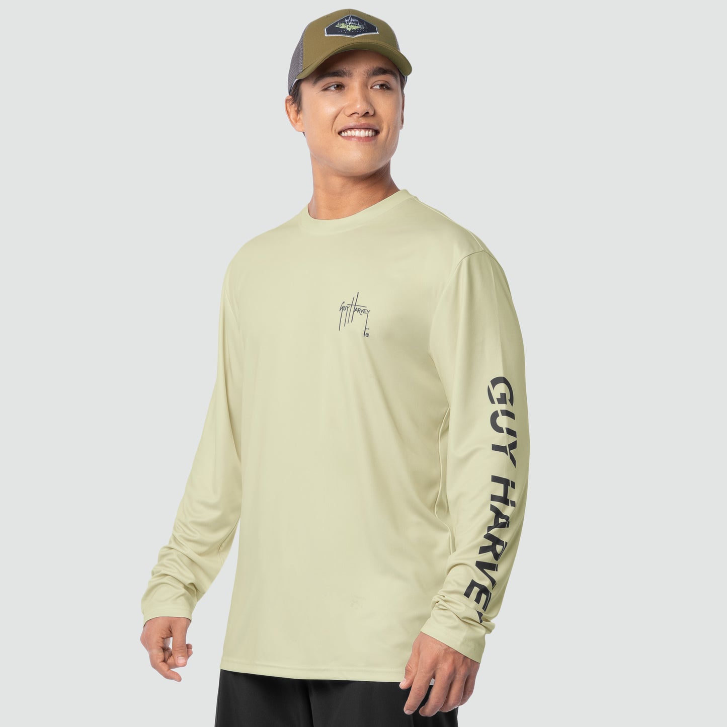 Bone white sun protection shirt being worn by a man.