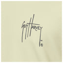 Signature of Guy Harvey on a beige background