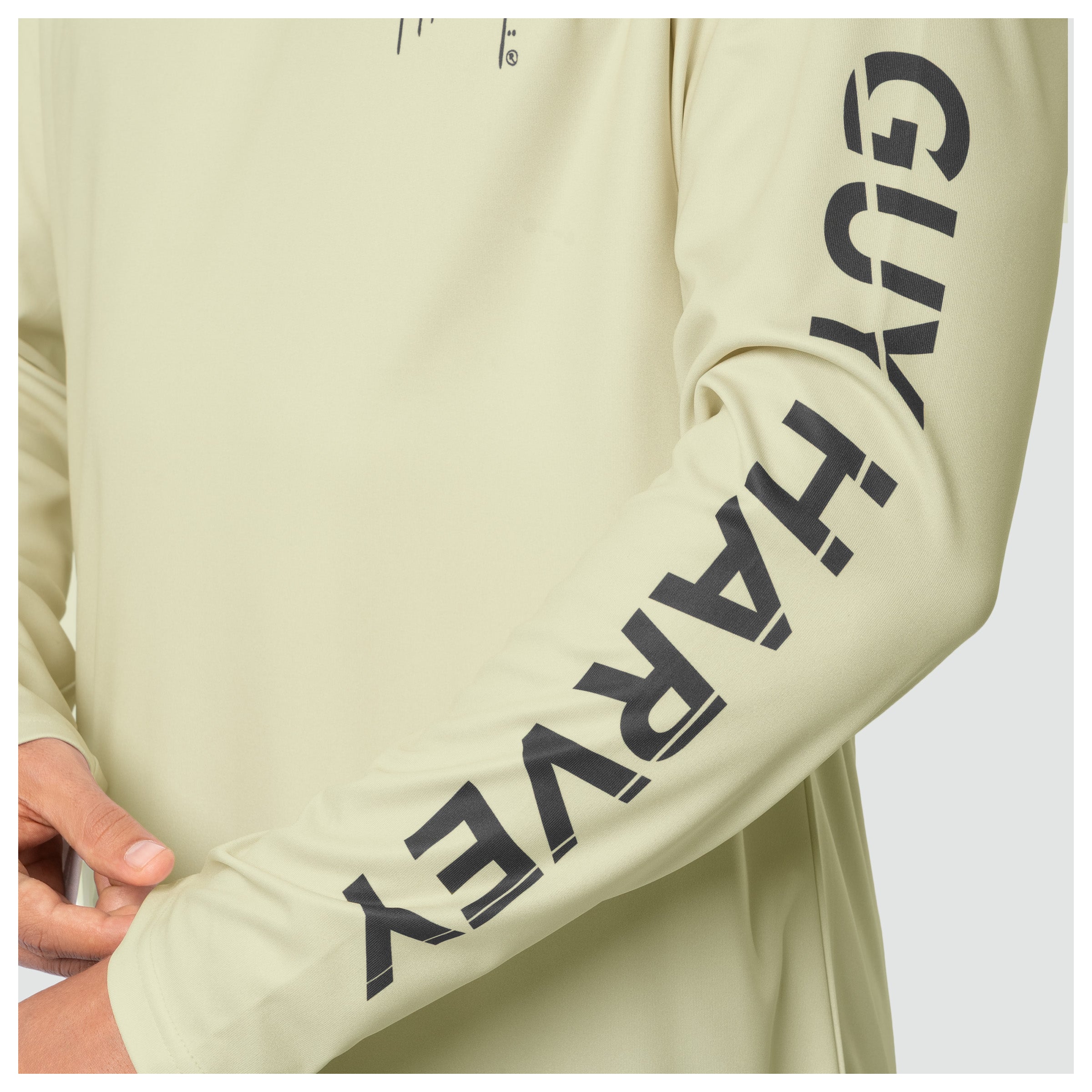Bone white sun protection shirt with 'Guy Harvey' branding on sleeves against a white background