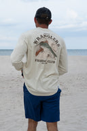 A man wearing a beige long sleeve HarborLite t-shirt with a trout graphic on the back.