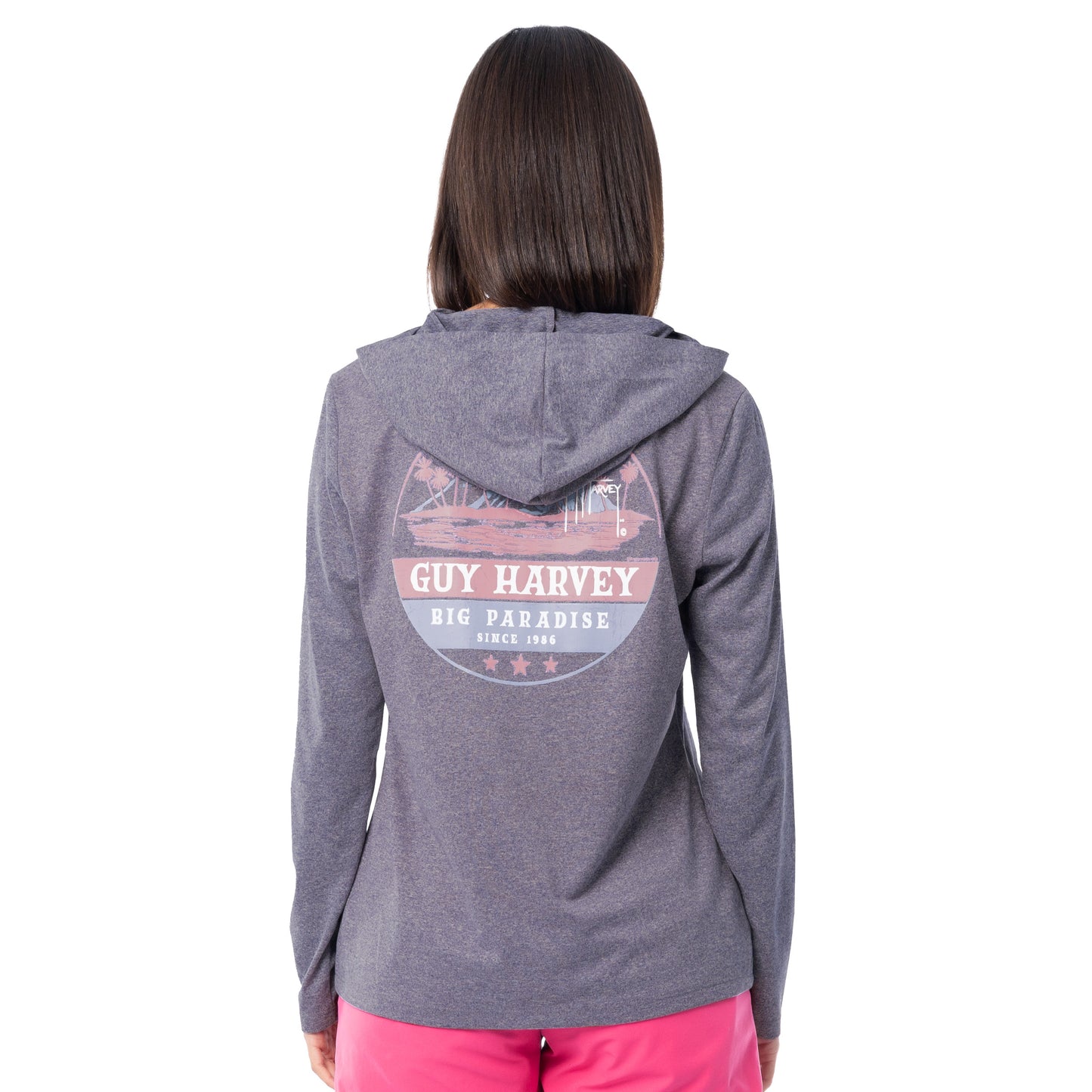 Person wearing a gray hoodie with Guy Harvey logo on the back