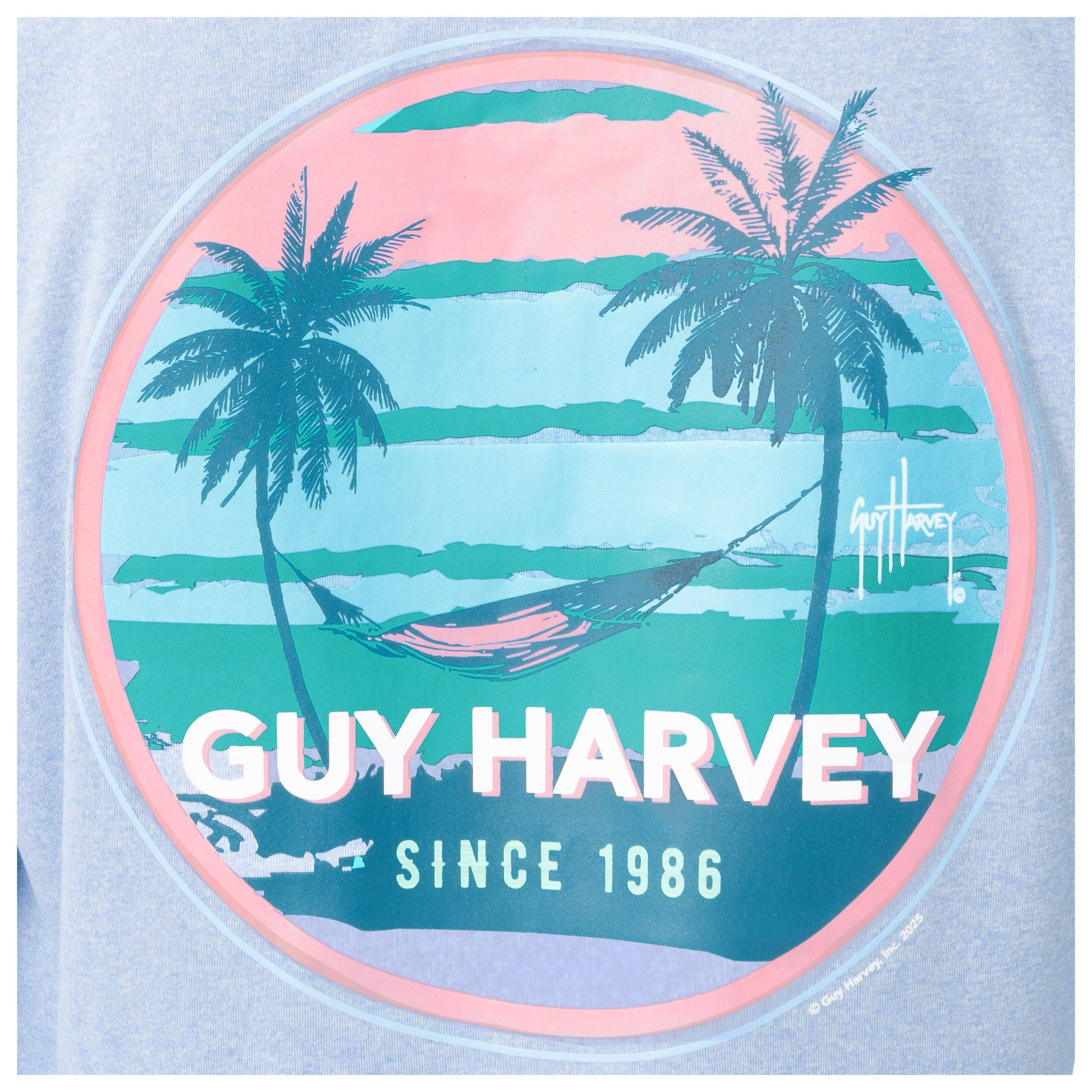 Circular Guy Harvey logo with palm trees and hammock design on a light blue background