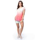 Woman wearing a gradient t-shirt and shorts on a white background