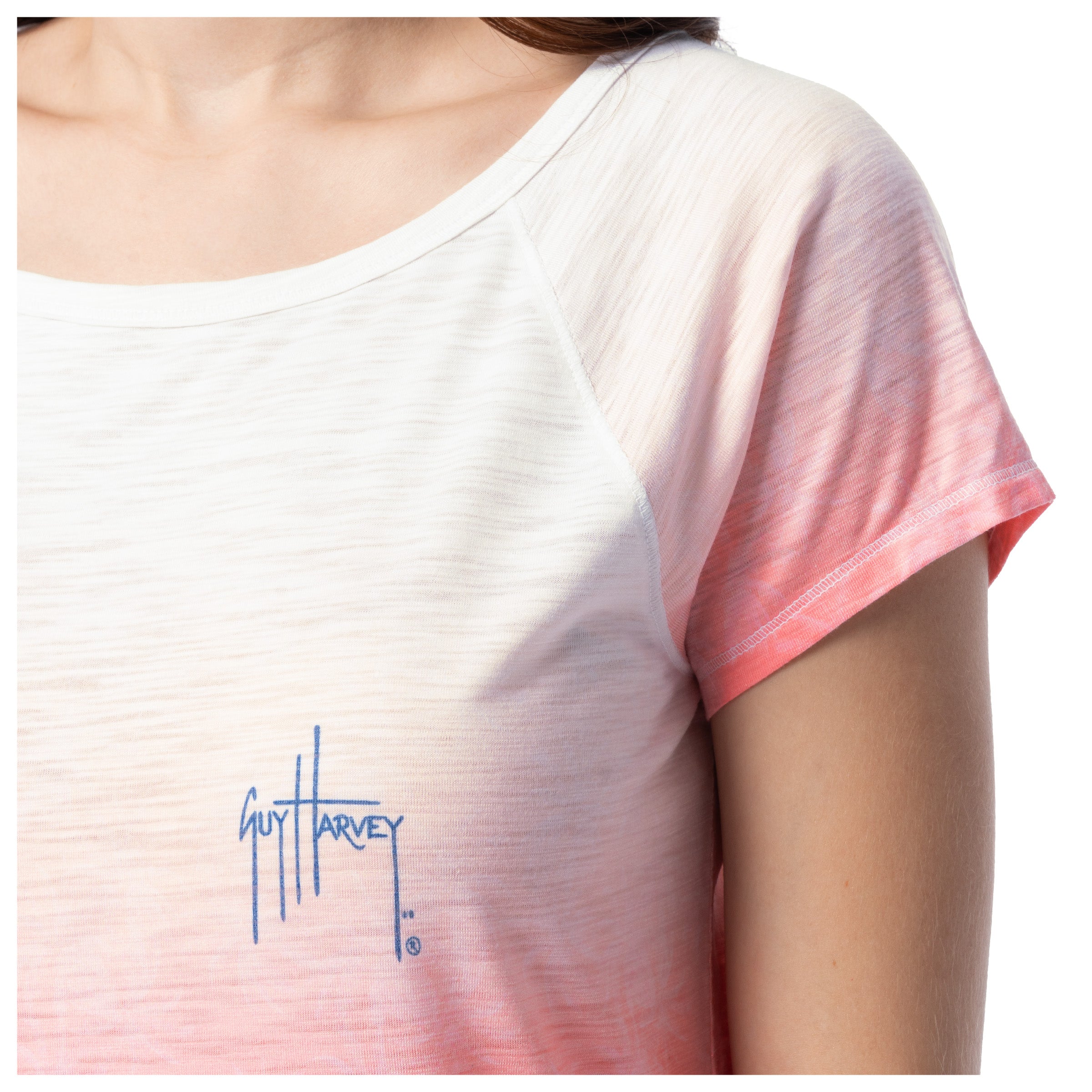 Pink and white shirt with Guy Harvey logo on a white background