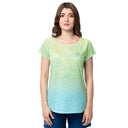 Woman wearing a green and blue gradient t-shirt with Guy Harvey signature logo on left chest on a white background