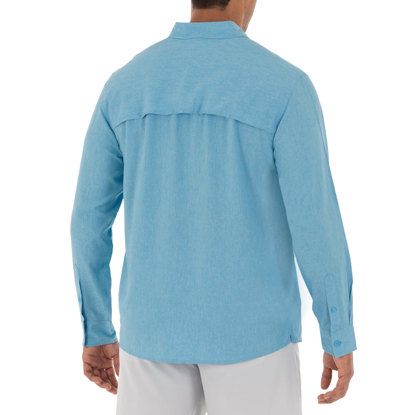 Light blue long-sleeve shirt worn by a person on a white background