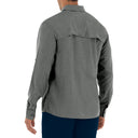 Gray long-sleeve shirt worn by a person on a white background