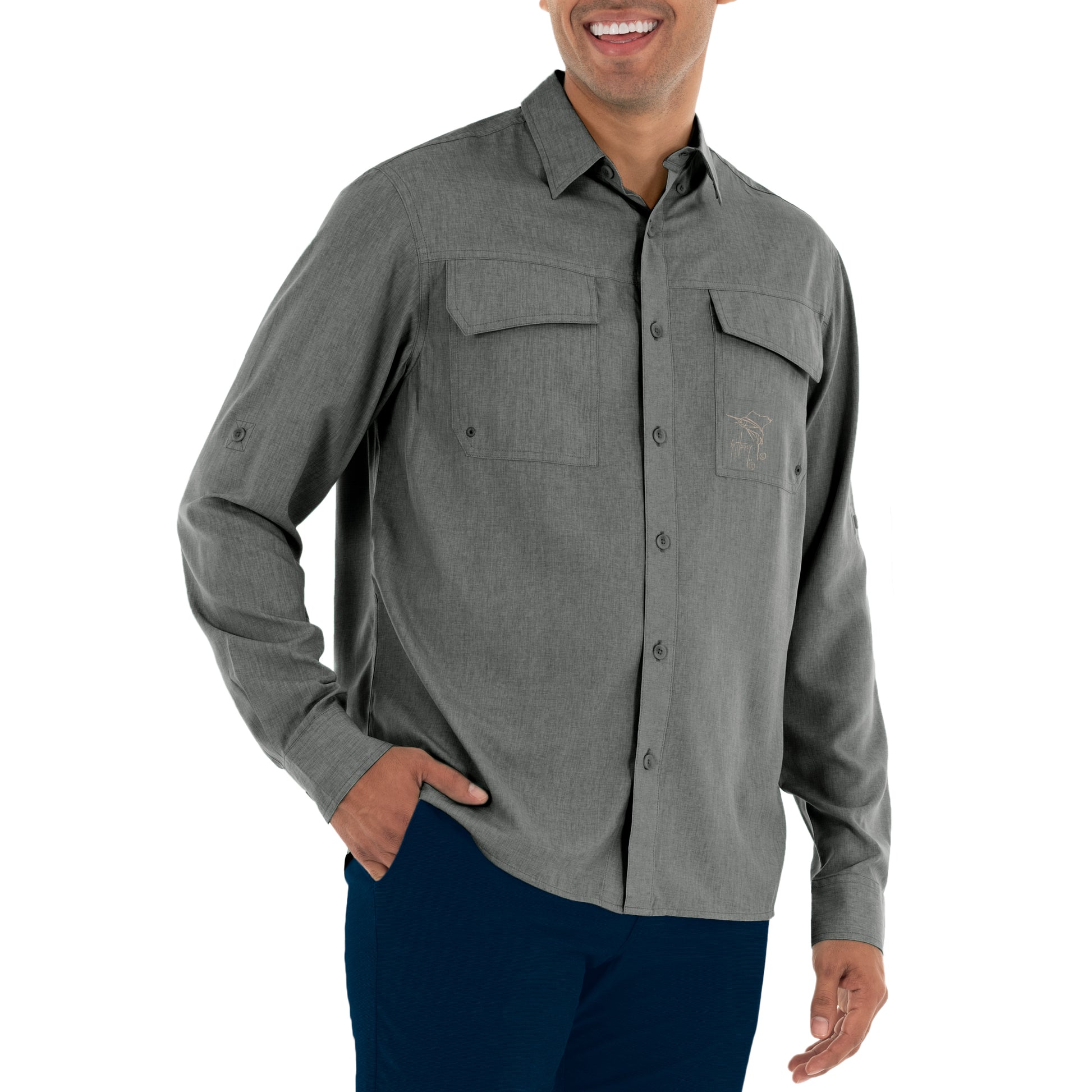 Man wearing a gray button-up shirt with two front pockets on a white background
