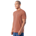 Man wearing a brown t-shirt with a logo on a white background