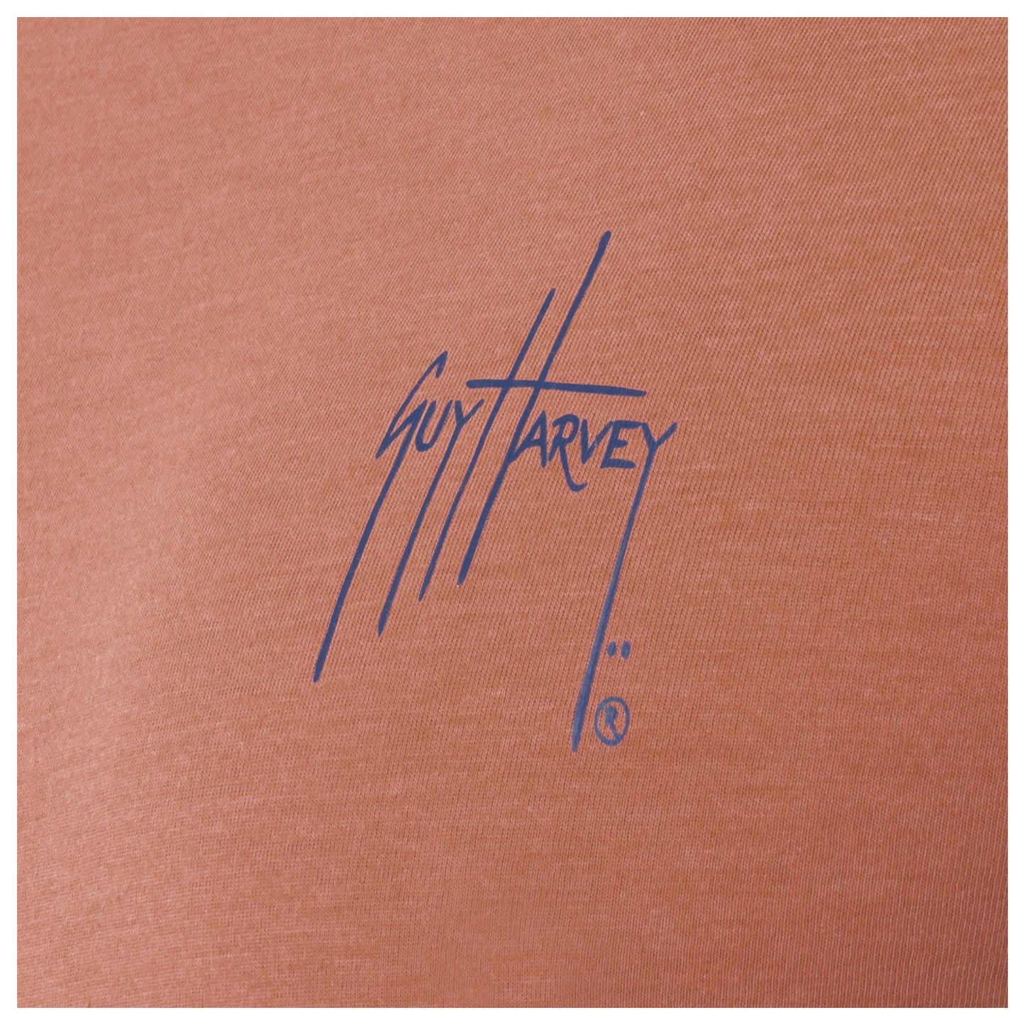 Brown fabric with Guy Harvey logo in blue