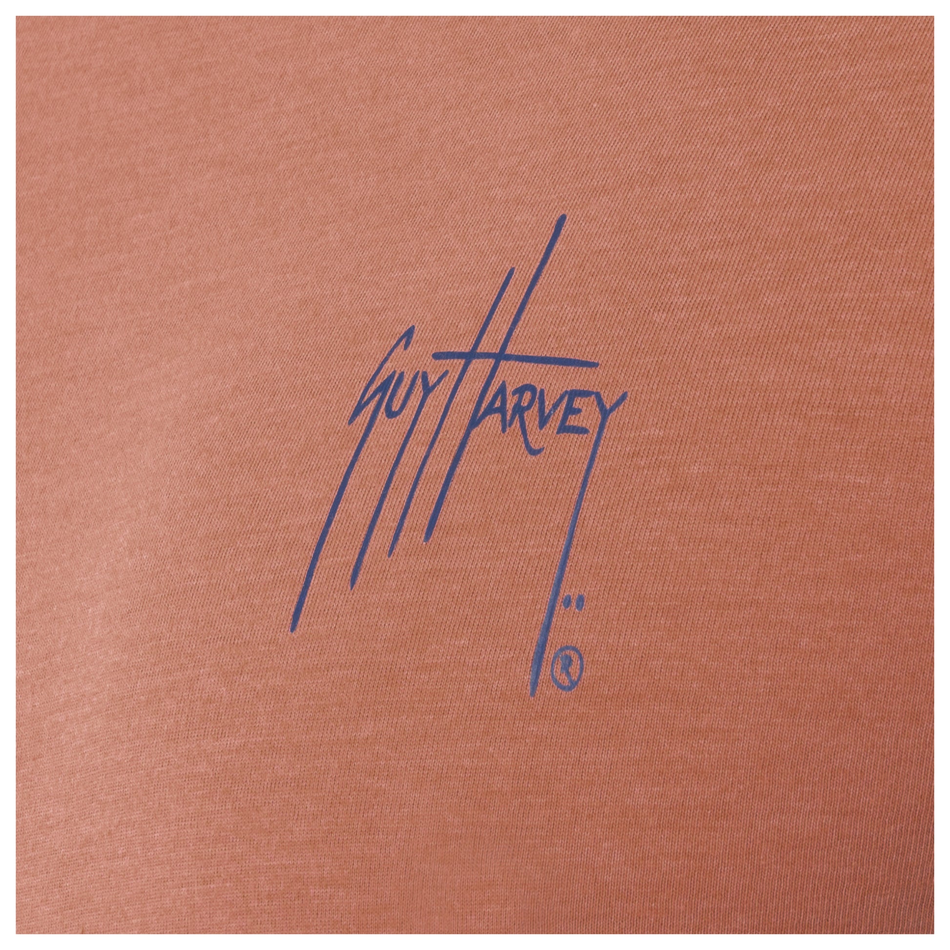 Brown fabric with Guy Harvey logo in blue