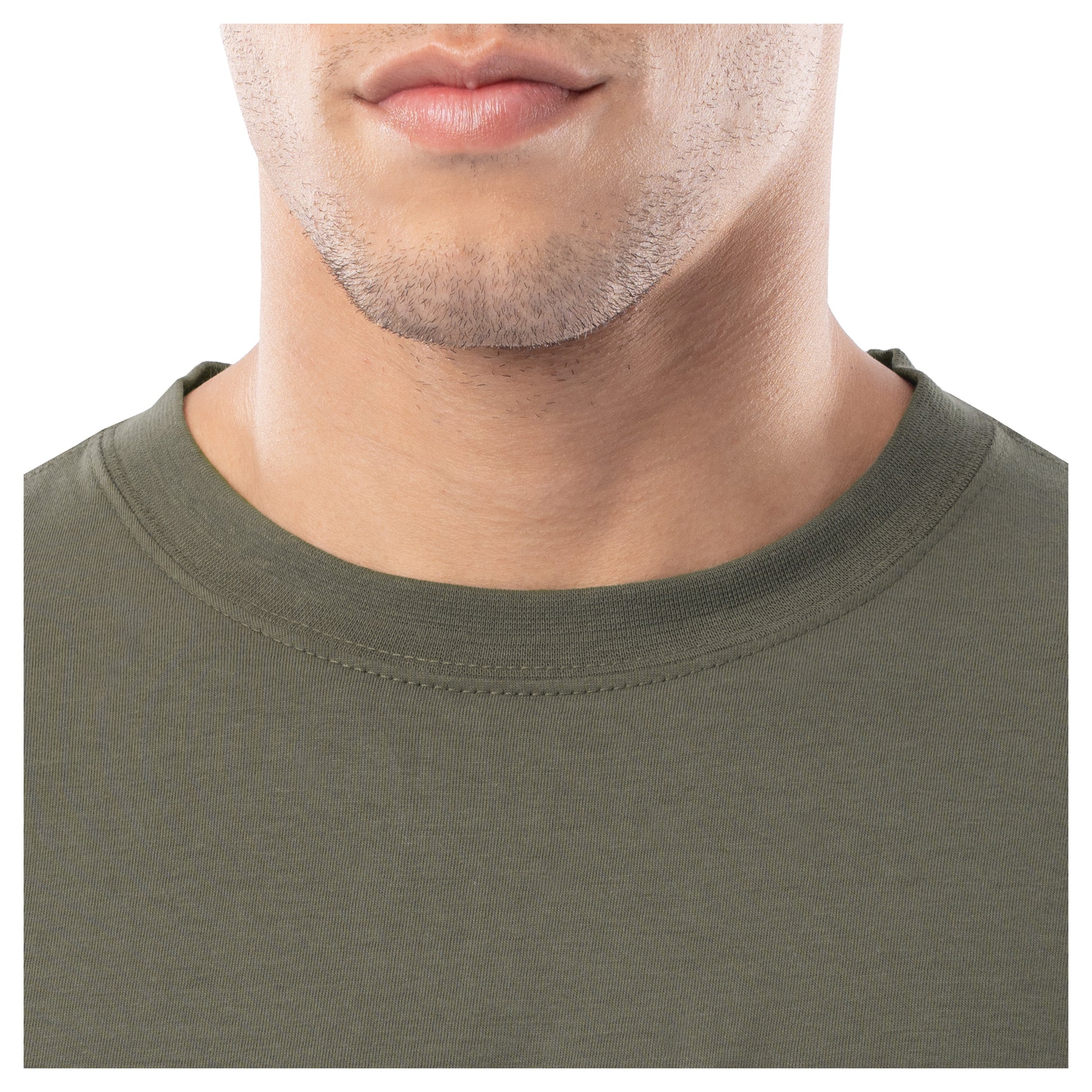 Close-up of a person wearing an olive green t-shirt on a white background