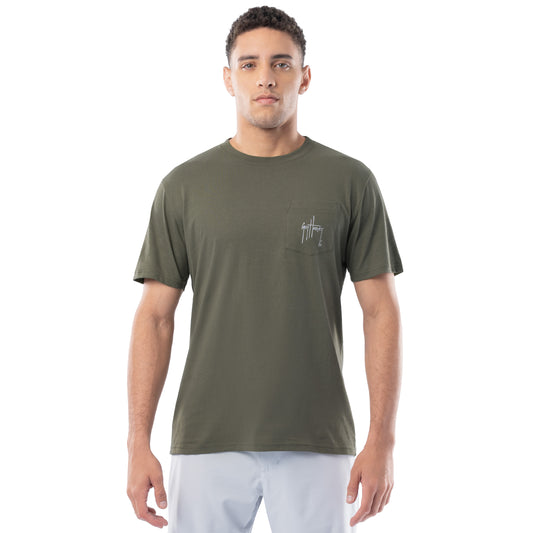 Man wearing a green t-shirt with a left pocket with Guy Harvey signature.