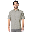 Man wearing gray Men’s AO Slam short-sleeve performance fishing shirt with fish print, UPF 40, and ventilated back.