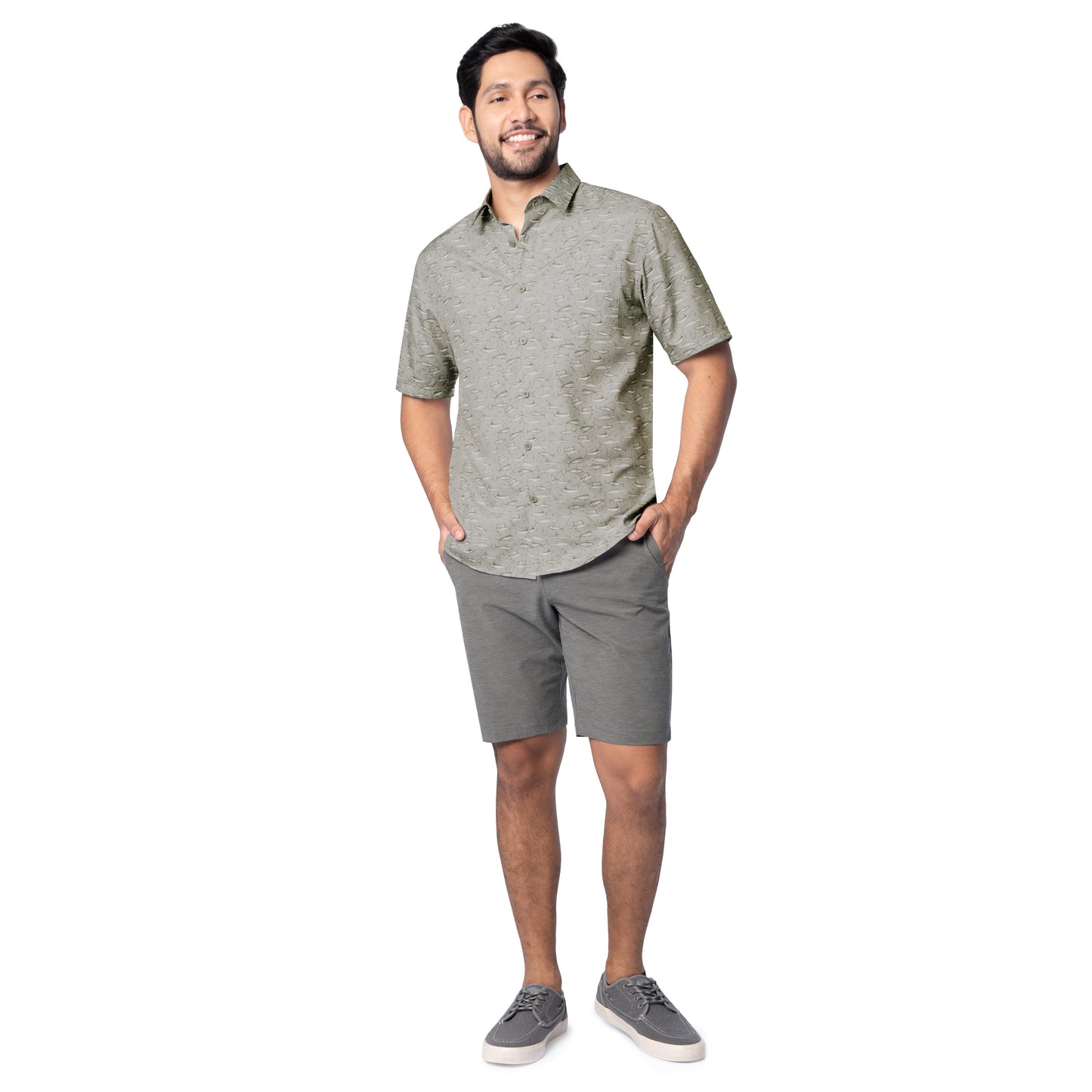 Man wearing a gray patterned shirt and shorts on a white background