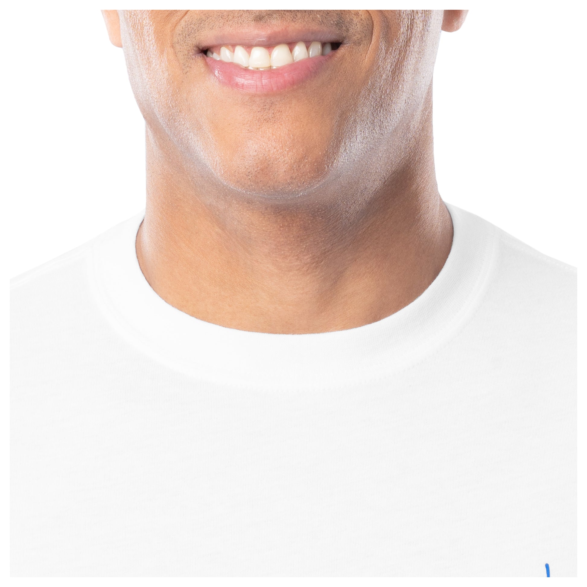 Close-up of a person wearing a white shirt with a plain background