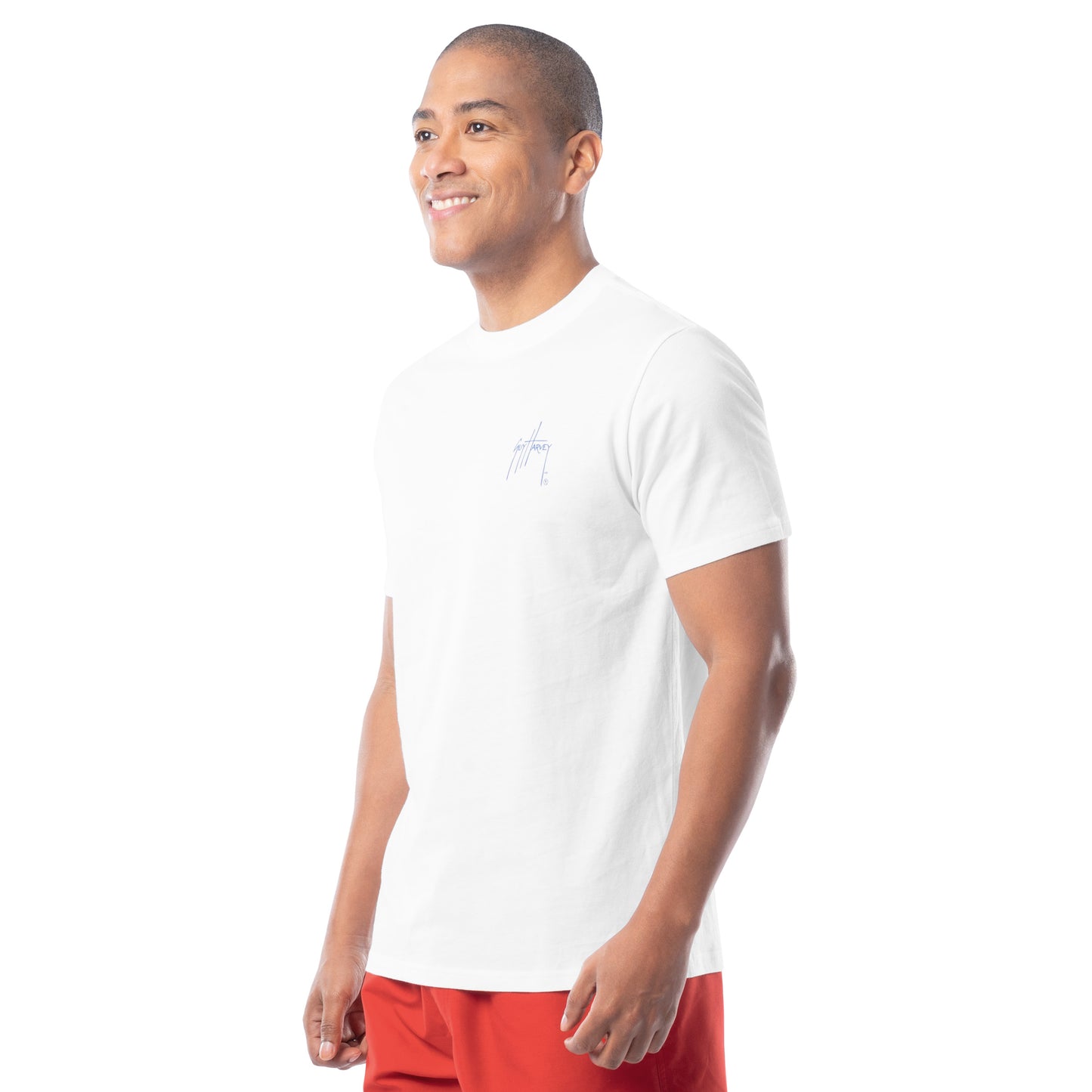 Man wearing a white t-shirt and red shorts on a white background
