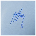 Blue 'Guy Harvey' logo on a light blue background