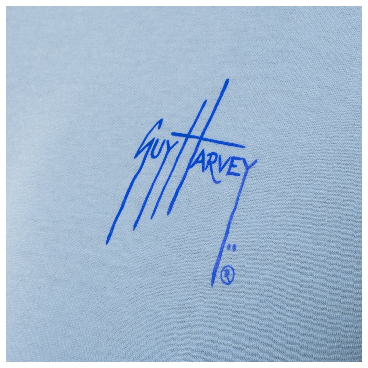 Blue 'Guy Harvey' logo on a light blue background