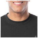 Close-up of a person wearing a black shirt with a white background