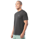 Man wearing a black t-shirt with a logo on a white background