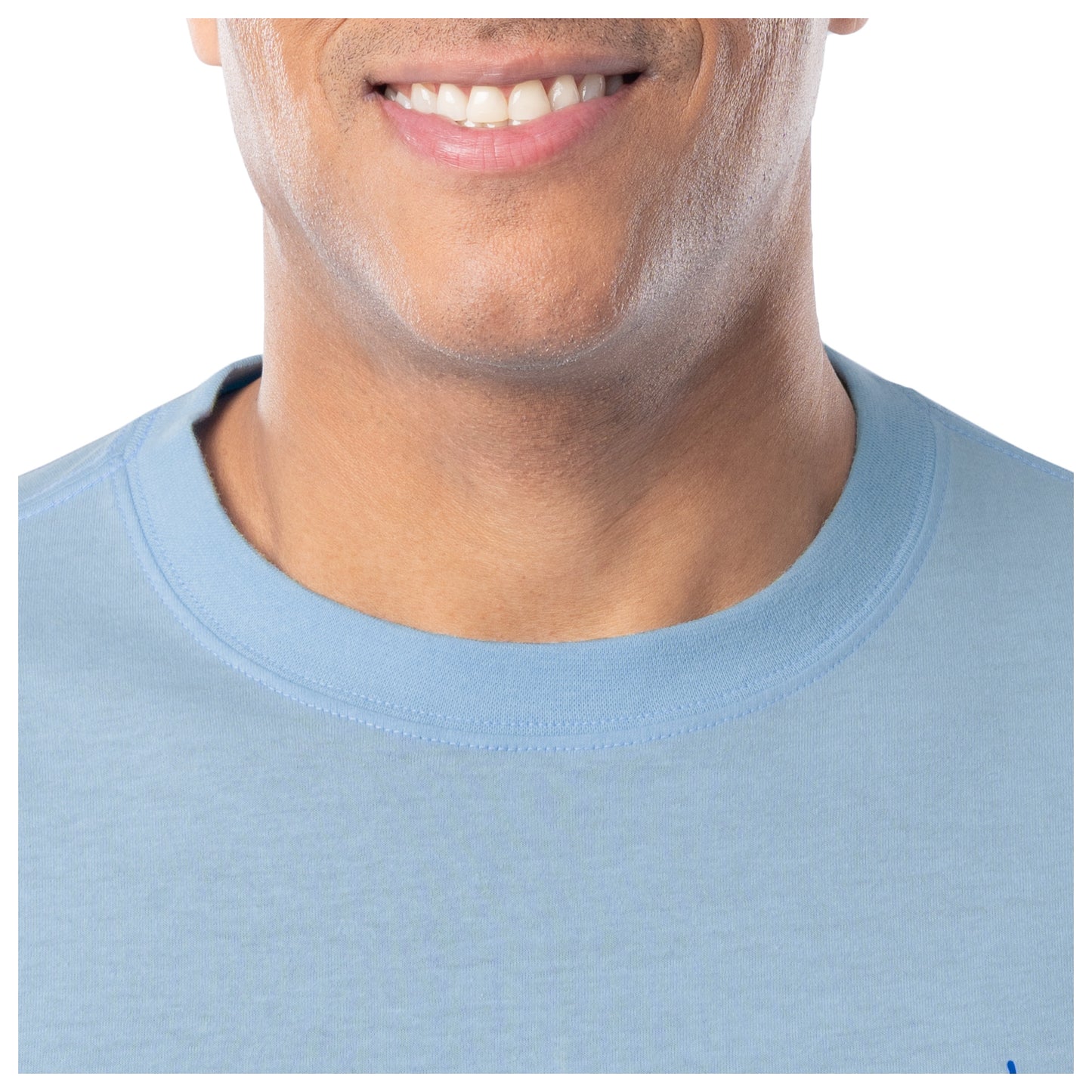 Close-up of a person wearing a light blue shirt with a plain background