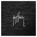 Close-up of white Guy Harvey logo printed on black brushed fleece fabric
