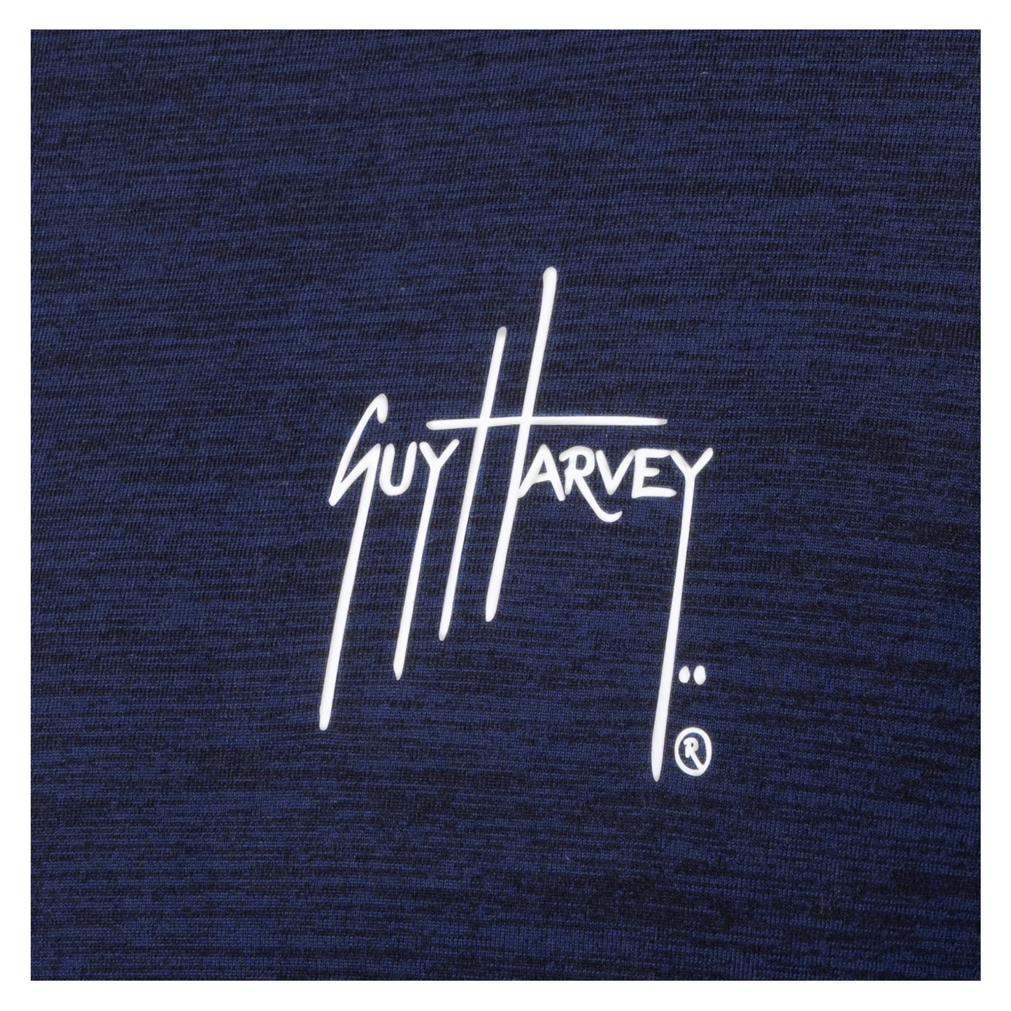 Close-up of white Guy Harvey logo printed on navy brushed fleece fabric