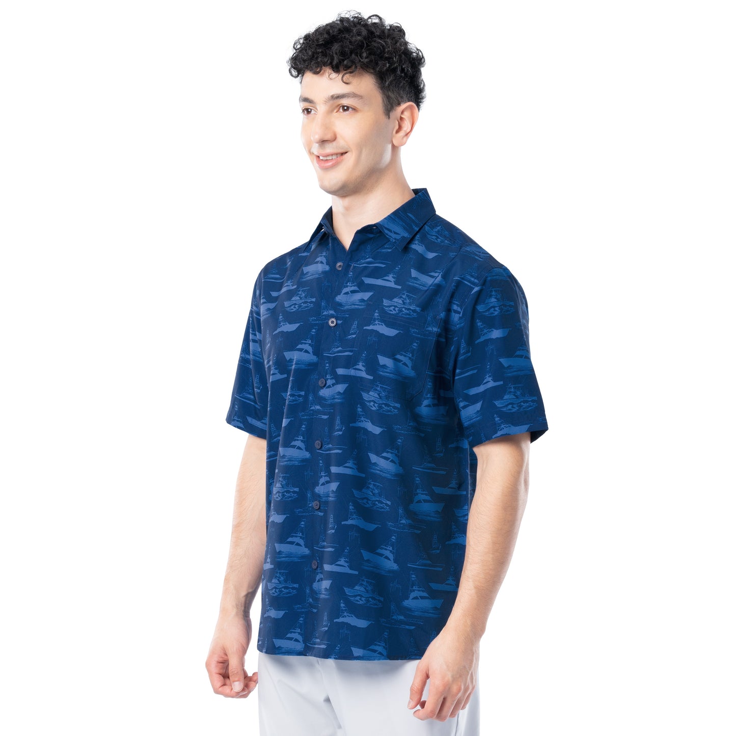 Man wearing a blue patterned shirt on a white background